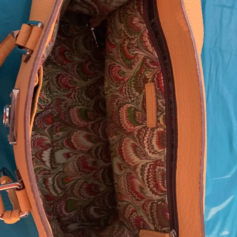 Almost New Dooney and Bourke Satchel with matching wallet. Rich Mustard Color